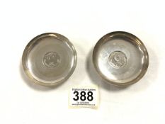 TWO WHITE METAL PAKISTAN SILVER INSET WITH ONE RUPEE COINS, SMALL SILVER DISHES, 88 GRAMS