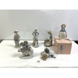 LLADRO GROUP OF TWO CHILD ESKIMOS ON A POLAR BEAR, THREE LLADRO FIGURES, AND A NAO PUPPY GROUP,