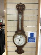 VICTORIAN CARVED OAK BANJO BAROMETER AND THERMOMETER WITH WHITE ENAMEL DIALS, 91CMS