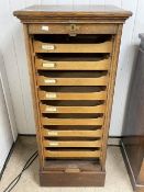 VINTAGE OAK TAMBOUR FRONTED CUPBOARD WITH NINE DRAWERS, 117 X 50 X 44CMS
