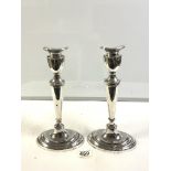 PAIR OF WEIGHTED UNMARKED SILVER BALUSTER CANDLESTICKS OF OVAL OUTUNE, 30CM