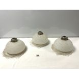 A SET OF THREE FROSTED GLASS HANGING LAMPS WITH LONG DROPS