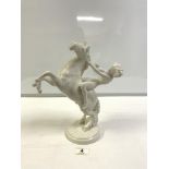 HUTSCHENREUTHER WHITE PORCELAIN FIGURE, OF A FIGURE ON ASCENDING HORSE, 32CMS