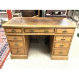 ASH PEDESTAL DESK WITH BROWN TOOLED LEATHER TOP AND BRASS HANDLES, 122 X 60CMS