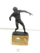 A 20TH-CENTURY BRONZE FIGURE OF A DISCUS THROWER, SIGNED TO BASE H. MIILLEN, WITH A BRASS