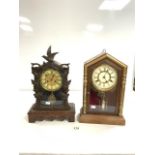 19TH CENTURY GERMAN CARVED BLACK FOREST MANTLE CLOCK WITH BIRD SURMOUNT, 44CMS AND AMERICAN GOLD