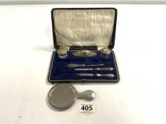 HALLMARKED SILVER MOUNTED PART MANICURE SET AND HALLMARKED SILVER ENGINE TURNED CHILDS HAND MIRROR