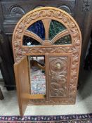 WOODEN CARVED ARCH MIRROR WITH COLOURED GLASS AND TWO DOORS, 81 X 50CMS