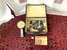 A VINTAGE BOLEX H8 32MM CINE CAMERA WITH ACCESSORIES IN A FITTED CASE