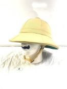 A KHAKI SAFARI PITH HELMET