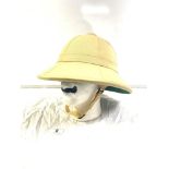 A KHAKI SAFARI PITH HELMET