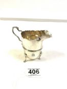 EDWARDIAN HALLMARKED SILVER HELMET-SHAPED CREAM JUG ON LION MASK AND PAD SUPPORTS, 10CMS, 82 GRAMS