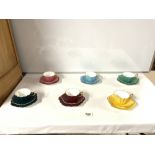 ROYAL STUART MIXED COLOURED PORCELAIN TEA CUPS AND SAUCERS