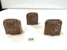 THREE VICTORIAN STONE WARE SASH WINDOW STOPS WITH LIONS HEAD DECORATION