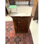 SMALL 19TH CENTURY CROSSBANDED MAHOGANY HANGING CORNER CUPBOARD, WITH TWO SHAPED SHELVES INSIDE (