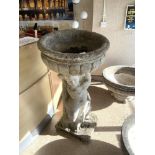 A LARGE CHERUB SUPPORT STONE GARDEN URN WITH FLUTED TOP (124 X 60CMS)