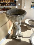 A LARGE CHERUB SUPPORT STONE GARDEN URN WITH FLUTED TOP (124 X 60CMS)