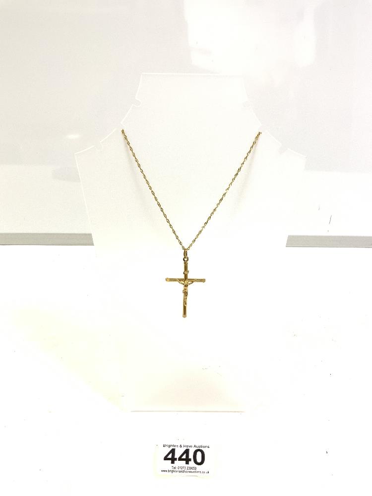 9CT GOLD CRUCIFIX ON A 9CT GOLD CHAIN 4.6 GRAMS, 18-INCH SIZE CHAIN