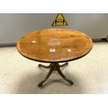 A REPRODUCTION OVAL YEWOOD OCCASION TABLE ON FOUR SPLAYED LEGS