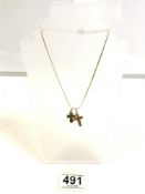 14 CARAT 585 GOLD NECKLACE WITH TWO 14 CARAT 585 GOLD CROSSES