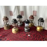 SIX VINTAGE TILLEY LAMPS - VARIOUS - FOUR BRASS AND TWO OTHERS