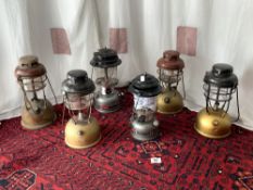 SIX VINTAGE TILLEY LAMPS - VARIOUS - FOUR BRASS AND TWO OTHERS