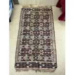 RED, RUST, BLUE AND WHITE KELIM RUG