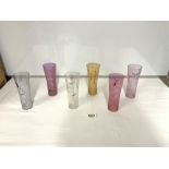 A SET OF SIX COLOURED GLASS, CLOWN DECORATED LONG GLASSES (18CMS)