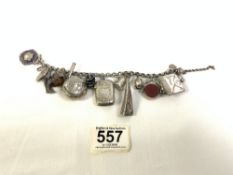 HALLMARKED SILVER CHARM BRACELET WITH SIXTEEN CHARMS
