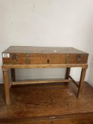 ANTIQUE MINIATURE CHEST ON STAND BRASS BOUND (56 X 28 X 8CMS) ON STAND (37CMS)