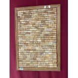 FRAMED COLLECTION OF WINE CORKS SET AS A PICTURE (45 X 66CMS)