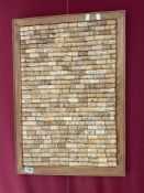 FRAMED COLLECTION OF WINE CORKS SET AS A PICTURE (45 X 66CMS)