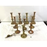 FOUR PAIRS OF VICTORIAN BRASS CANDLESTICKS, A SINGLE GEORGIAN BRASS CANDLESTICK WITH PUSHER, AND A