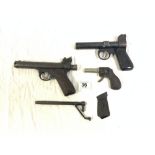 TWO VINTAGE WEBLEY JUNIOR AIR PISTOLS 177, AND A TOY TINPLATE PISTOL - STAMPED HOWE RMC