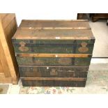 TWO VINTAGE WOOD AND METAL-BOUND TRUNKS