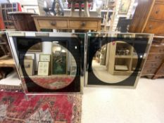 A PAIR OF RETRO BLACK AND CLEAR WALL MIRRORS - 90CMS SQ