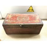 A 19TH-CENTURY CHINESE EXPORT HAND PAINTED RED LEATHER CAMPHORWOOD TRUNK, WITH FLORAL MOTIF