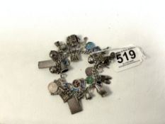 SILVER CHARM BRACELET WITH 35 CHARMS