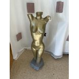 A GOLD-PAINTED NUDE FEMALE TORSO FIGURE (90CMS)