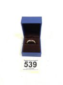 9CT GOLD RING WITH A RUBY AND TWO DIAMONDS, RING SIZE O.5