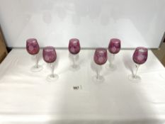 SET OF SIX ETCHED CRANBERRY AND CLEAR GLASS WINE GLASSES