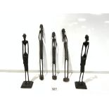 FIVE AFRICAN CARVED WOODEN TRIBAL FIGURES, 30 CMS,