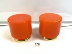 A PAIR OF MID-CENTURY DESIGN ORANGE GLASS AND BRASS TABLE LAMPS