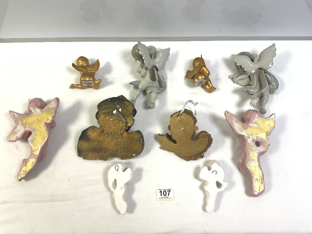 A GROUP OF 10 PORCELAIN AND PLASTER CHERUB WALL FIGURES - Image 4 of 4