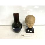 RESIN HEAD OF A CHILD WITH A LUSTRE GLAZED VASE 25 CMS
