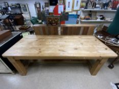 A HEAVY SOLID PINE REFRECTORY TABLE ON THICK SQUARE LEGS ON H STRETCHER, 212X92X75 CMS.