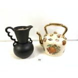 A RAINBOW POTTERY BLACK GLAZED JUG AND A STAFFORDSHIRE FRUIT DECORATED TEA POT