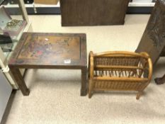 A FLORAL AND BIRD DECORATED RECTANGULAR SIDE TABLE, 55X38X42, AND A CANE MAGAZINE RACK.