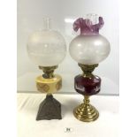 TWO VICTORIAN STYLE BRASS AND CAST IRON OIL LAMPS WITH ETCHED GLASS SHADES