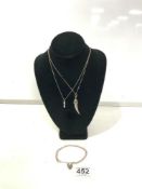 TWO 925 SILVER NECKLACES AND PENDANTS, AND A SILVER BRACELET WITH HEART LOCK.
